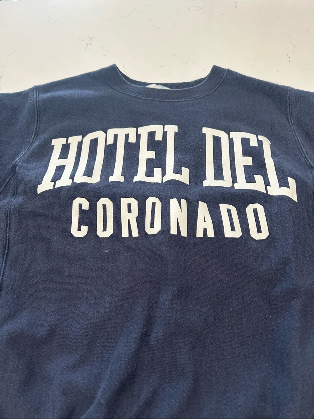 Champion Navy Crewneck Sweatshirt with White Hotel Del Coronado Graphic
